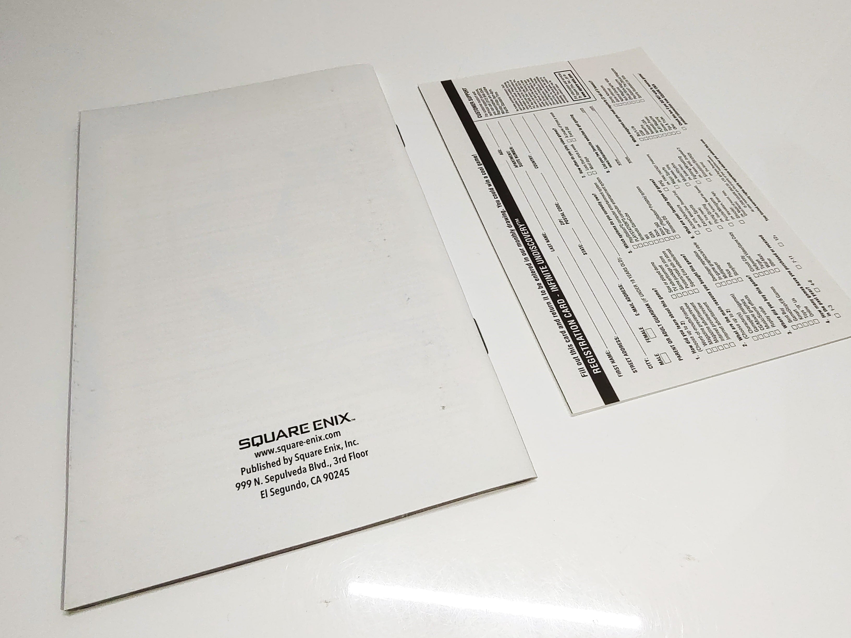 Infinite Undiscovery | Xbox 360 | Back of manual and registration card