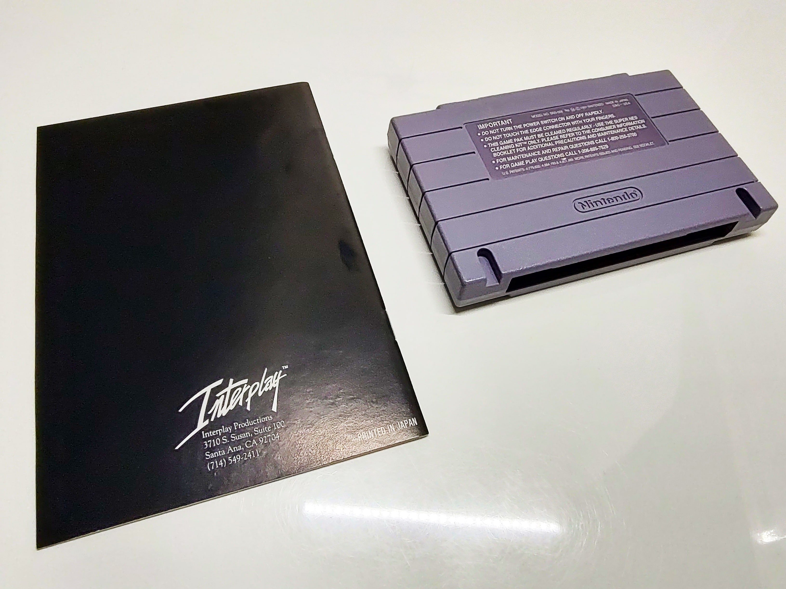 RPM Racing | Super Nintendo | Back of manual and cartridge
